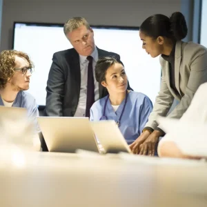 healthcare administration professionals having a group meeting