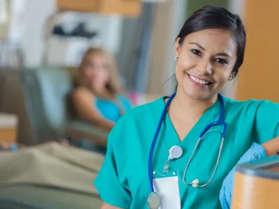 medical assistant smiling at camera